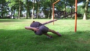 TECHNICORDS SPEEDSKATING TRAINING BELTS 3 a man is doing a push up on a park bench